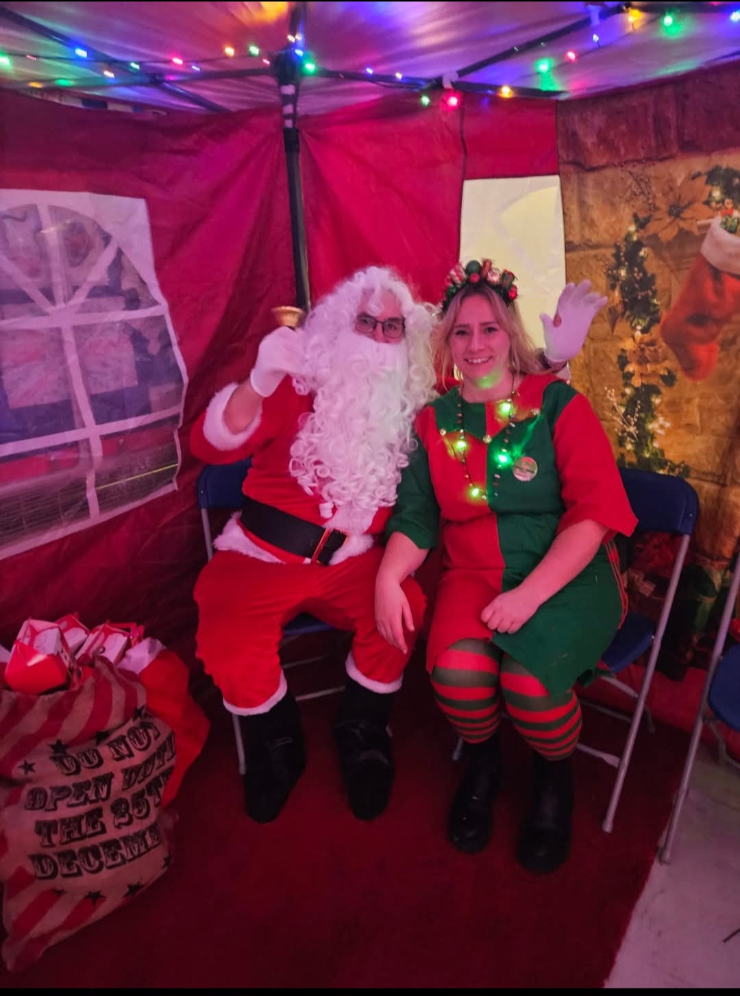 Sam and Santa having a picture